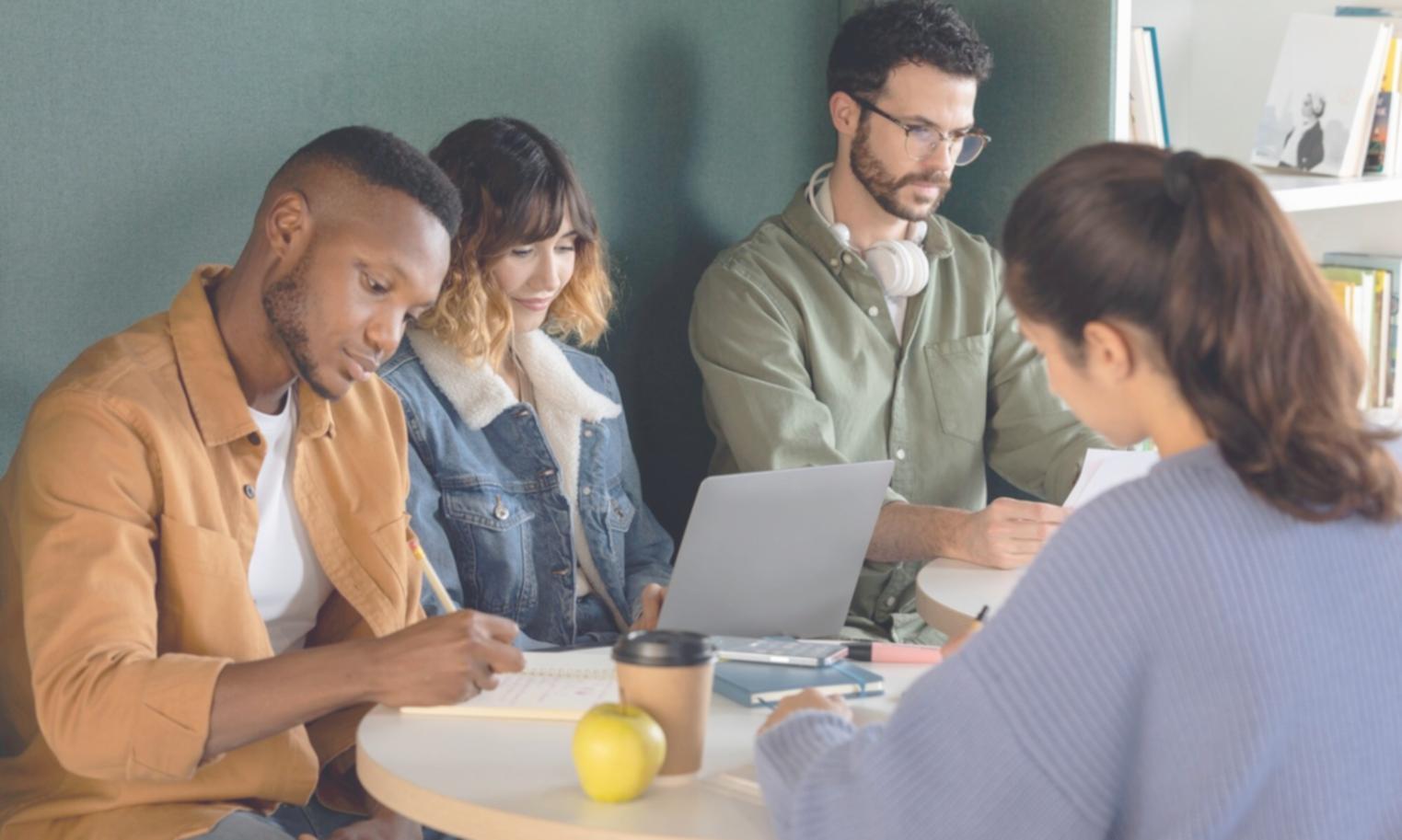Professional business team reviewing financial reports and investment strategies during corporate training session